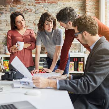 small group of colleagues having a discussion